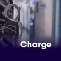 Detectives have charged a Bulwell man with assisting an offender after a police officer was shot while attending an incident in Nottingham city centre