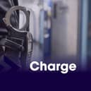 Detectives have charged a Bulwell man with assisting an offender after a police officer was shot while attending an incident in Nottingham city centre