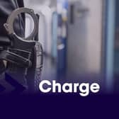 Detectives have charged a Bulwell man with assisting an offender after a police officer was shot while attending an incident in Nottingham city centre