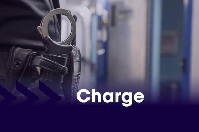 Detectives have charged a Bulwell man with assisting an offender after a police officer was shot while attending an incident in Nottingham city centre
