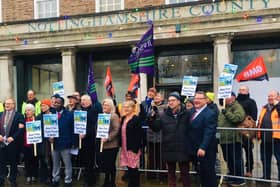 The group held protests outside County Hall as part of their successful campaign. Photo: Submitted