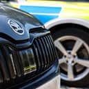 A driver who was in the country illegally was caught out after an unexpected encounter with an unmarked police car.