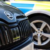 A driver who was in the country illegally was caught out after an unexpected encounter with an unmarked police car.