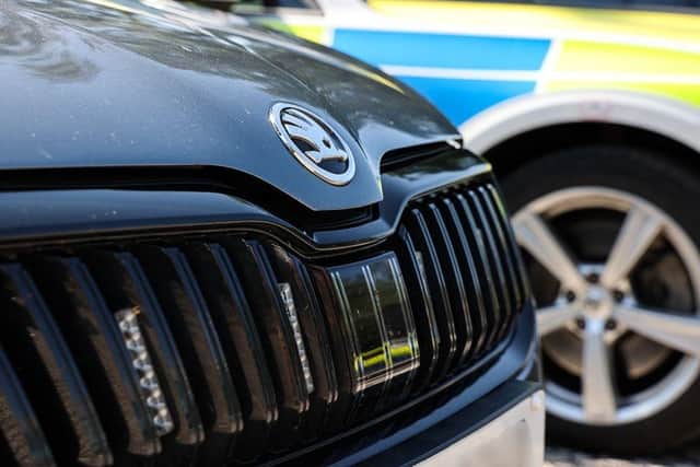 A driver who was in the country illegally was caught out after an unexpected encounter with an unmarked police car.