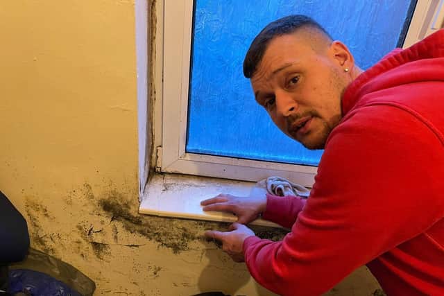 Gavin Hufton points out the mould in his rented house co-owned by Ashfield District Council leader Coun Jason Zadrozny