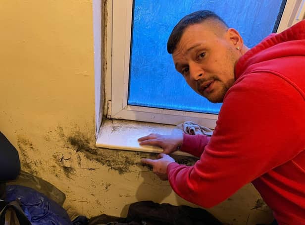 Gavin Hufton points out the mould in his rented house co-owned by Ashfield District Council leader Coun Jason Zadrozny