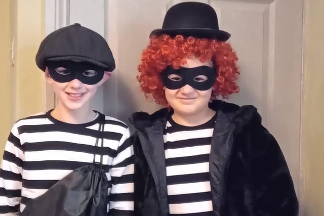 Riley Wightman and Amelia Black, age 10, as Burglar Bill and Burglar Betty.