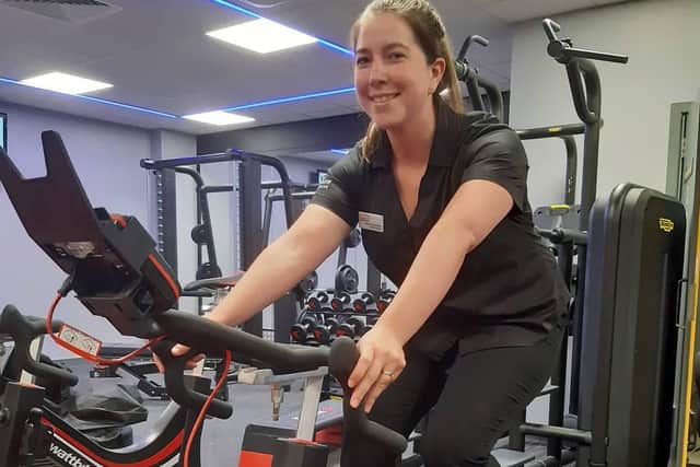 Deanna Housley demonstrating one of the new hi-tech Wattbikes