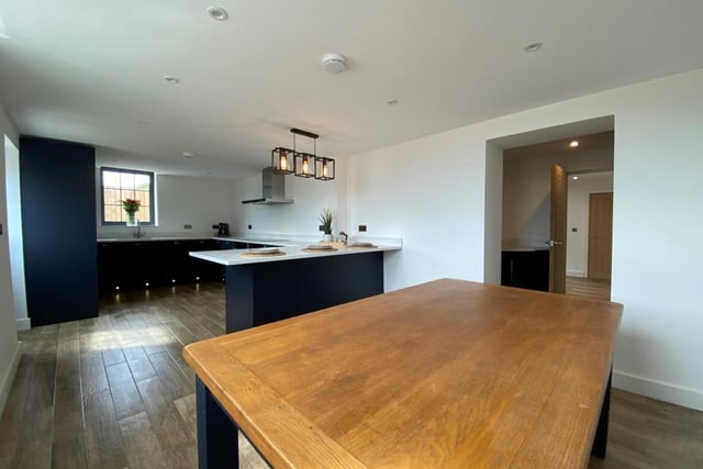 The dining kitchen is the first room to look at. It boasts a host of integrated appliances, including double oven, electric hob, extractor fan and dishwasher.