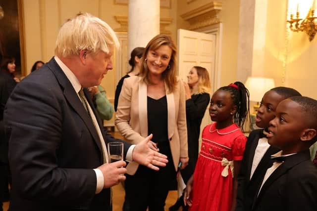 Waimi, Mbetmi and Yimi Fongue meet Prime Minister Boris Johnson inside No 10