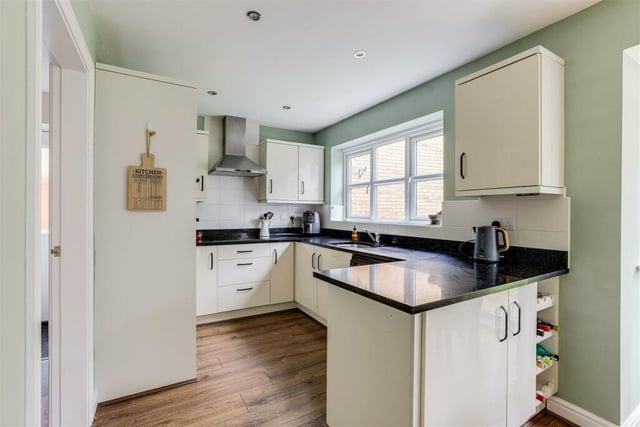 Next stop is the kitchen diner, which boasts a range of modern, fitted base and wall units with worktops. There is an integrated double oven, ceramic hob and extractor fan, and an under-mounted sink with stainless steel mixer tap and drainer.