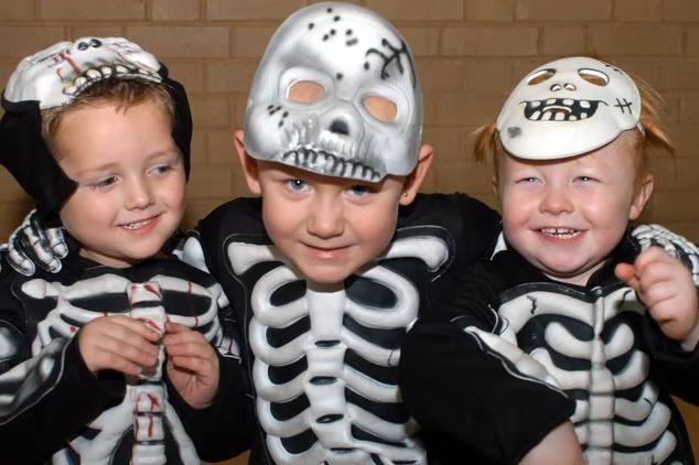 These three skeletons enjoys some bone-chillingly fun festivities at the Hucknall Leisure Centre Halloween party in 2007