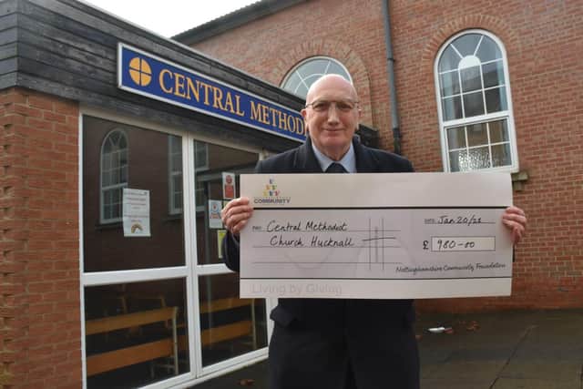 Hucknall councillor John Wilmott with the cheque presented to the Central Methodist Church in the town