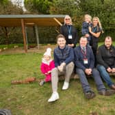 Hucknall MP Mark Spencer (centre) with Hucknall councillor Phil Rostance (left) and representatives of QTS and and staff and children from the nursery at the new forest garden