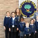 Head teacher Lorna Haskey (left) and deputy head Jodie Round celebrate Crabtree Farm Primary School's 'Good' rating with some of the pupils.