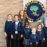 Head teacher Lorna Haskey (left) and deputy head Jodie Round celebrate Crabtree Farm Primary School's 'Good' rating with some of the pupils.