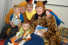 2007: Connor Hind and Nikyla Bartram are pictured with staff members Sarah Wilkinson, Angela Fletcher and Judy Robinson at the book start day at Bulwell SureStart.