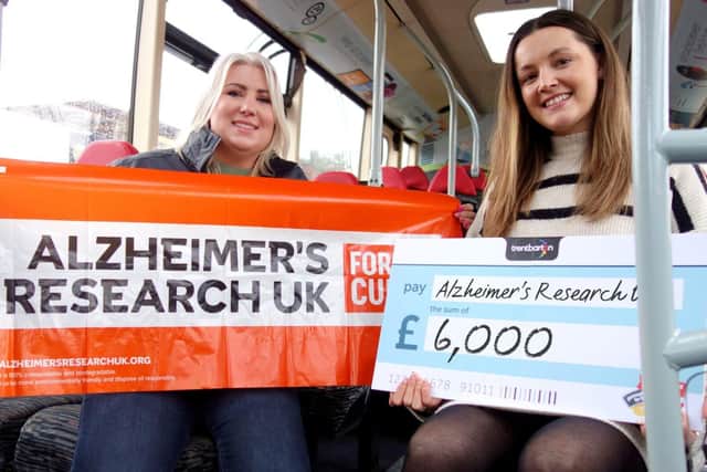 Alzheimer’s Research UK Regional Fundraising Officer Zoe Dean with trentbarton’s Scarlet McCourt