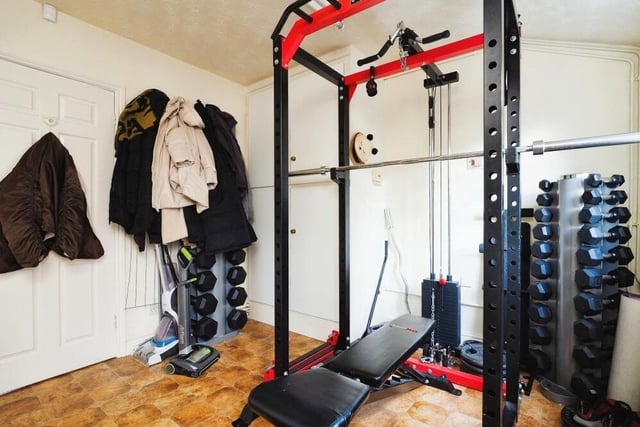 A second look at the mini-gym, which can double up as a cloakroom too.