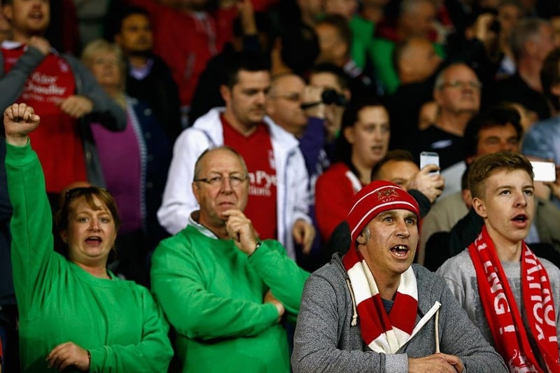 Forest fans wear green Brian Clough jumpers to mark 10 years since his death during the Capital One Cup third round match between Tottenham Hotspur and Nottingham Forest at White Hart Lane on September 24, 2014.