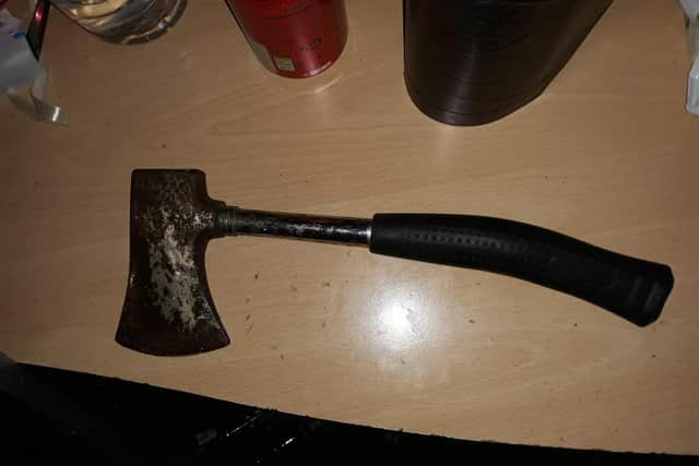 Officers recovered an axe from the property in Bulwell.