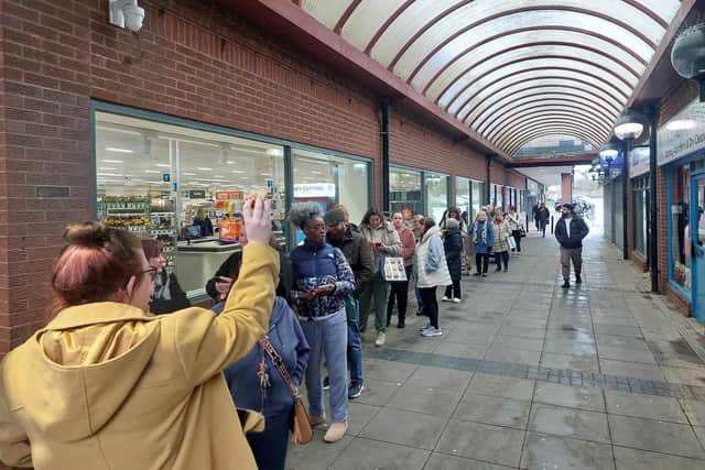 A large queue of shoppers had already formed along Central Walk an hour before the store opened. Photo: National World