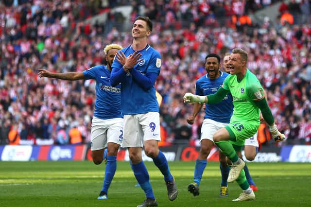 Oli Hawkins celebrates after scoring the winning penalty in the Checkatrade Trophy Final for Portsmouth against Sunderland at Wembley Stadium in March 2019.