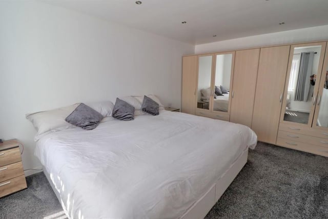 One of the four bedrooms at the Blidworth property is on the ground floor. A good size, it has space not only for a double bed but also wardrobes and storage. The floor has a grey carpet that adds to the room's cosiness.