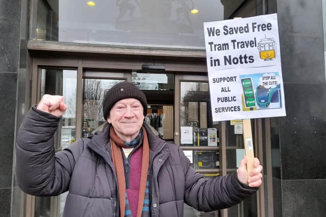 Des Conway celebrates outside County Hall after free tram travel for pass holders was saved. Photo: Submitted