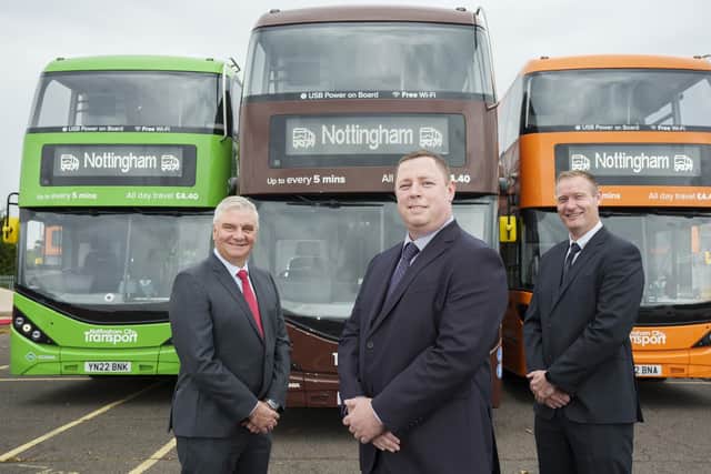NCT's latest bio-gas buses with, from left, Mark Oliver (Scania), Liam O'Brien (NCT) and Lee Salt (ADL). Photo: NCT