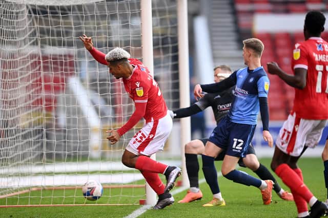 Lyle Taylor opens the scoring against Wycombe Wanderers. (Photo by Laurence Griffiths/Getty Images)