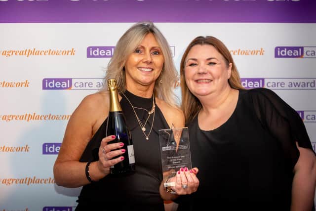 Allison Fry (left), Support Star of the Year winner, with her award and Ideal Care’s regional director, Lisa Harding.