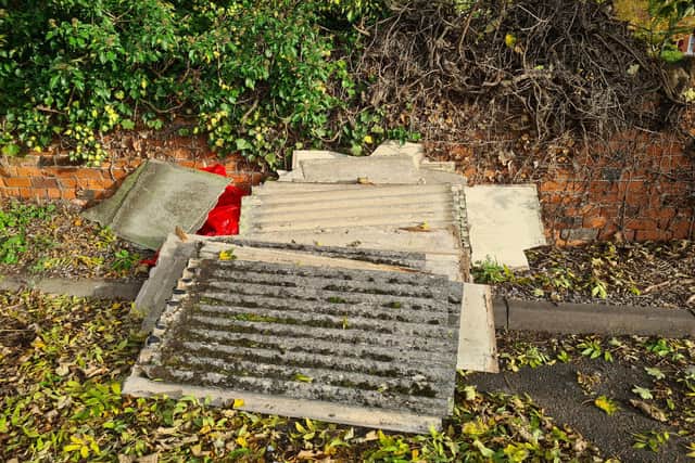 A heap of suspected asbestos waste was dumped in the car park at the back of the Red Lion.