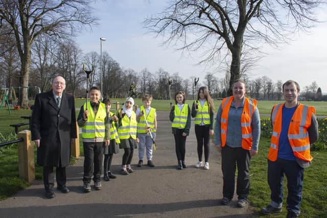 Hucknall councillors John Wilmott (left) and Lee Waters join Coun Samantha Deakin and volunteers for a litter pick in the town