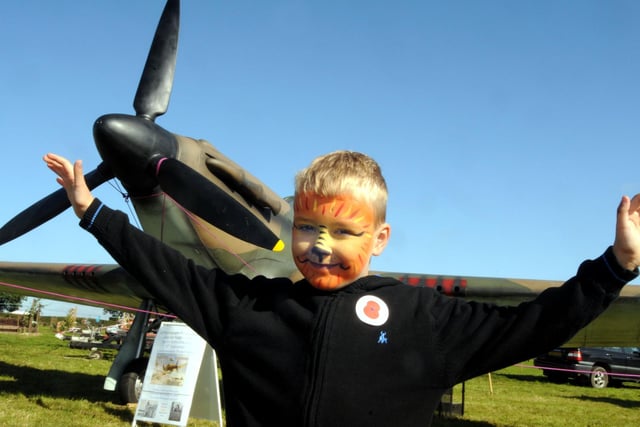 2010: Tyler Woolley of Hucknall is pictured next to a Hurricane at the Moorgreen Show.