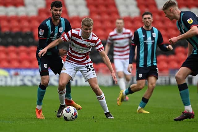 Hucknall's Jack Goodman in first team action for Doncaster Rovers.