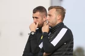 Joint managers Louis Bland and Reece Limbert watch on during Saturday's draw. Photo by Jason Chadwick.