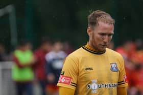 A dejected Matt Thornhill reflects as Basford United exit the FA Cup (IMAGE: Mick Gretton)
