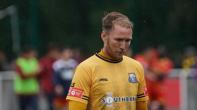 A dejected Matt Thornhill reflects as Basford United exit the FA Cup (IMAGE: Mick Gretton)