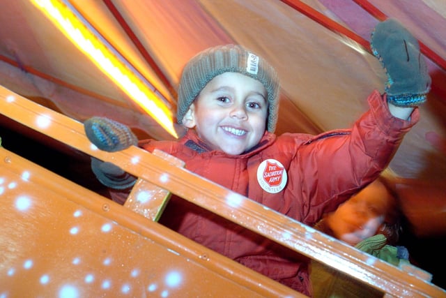 Sam Watson, (then four), from Hucknall enjoys one of the fairground rides in 2008.