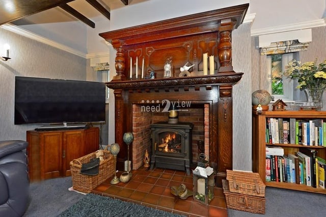 The £750,000 property is notable for two or three lovely feature fireplaces. Here is arguably the most attractive of them in the dining area of the kitchen. It oozes character.