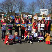 Pupils of Leen Mills Primary School in Hucknall hold some of the Letters of Hope high