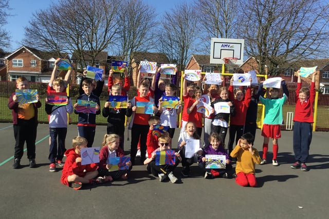 Pupils of Leen Mills Primary School in Hucknall hold some of the Letters of Hope high