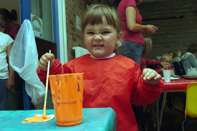 2007: Sasha Ford, aged two, tries some painting at the Saplings Summer Play Scheme fun day in Hucknall.