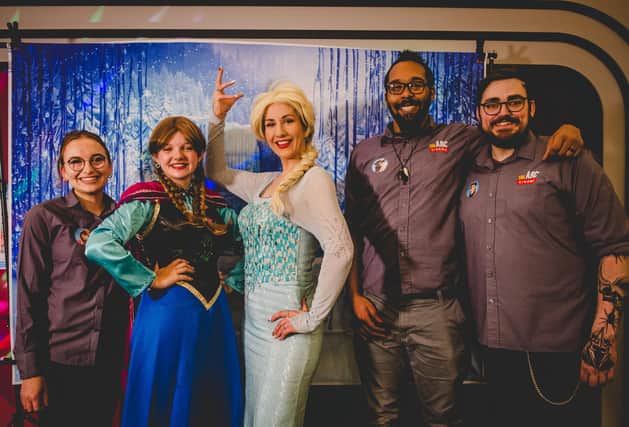 Arc staff with frozen stars Elsa and Anna