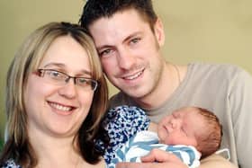 Judith and Tristan Thompson of Kirkby proudly show off their newborn son Joshua Brian Peter Thompson who was the first baby to be born at the Dukeries on New Year's Day, checking in at 9.04am. Weighing 8lb, he was the couple's first baby.