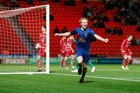 Mansfield Town midfielder George Lapslie celebrates his second goal against Doncaster Rovers during the  Emirates FA Cup second round at the Keepmoat Stadium  Photo credit should read : Chris Holloway / The Bigger Picture.media