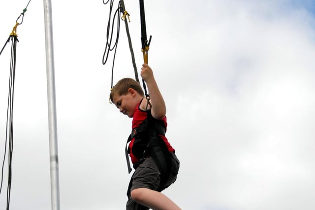 Nine-year-old Peter Cable from Hucknall takes to the air at the Moorgreen Show.