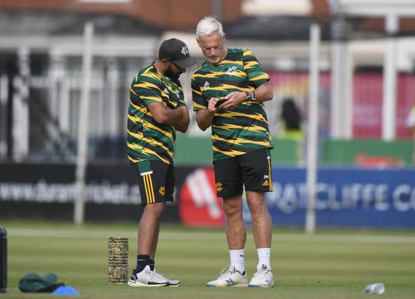 Notts Outlaws Coach Peter Moores (r) has signed a new deal with the club. (Photo by Tony Marshall/Getty Images)