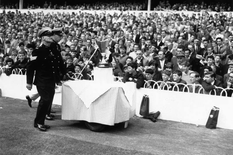 The European Cup Winners Cup on display before a match between Tottenham Hotspur and Nottingham Forest.